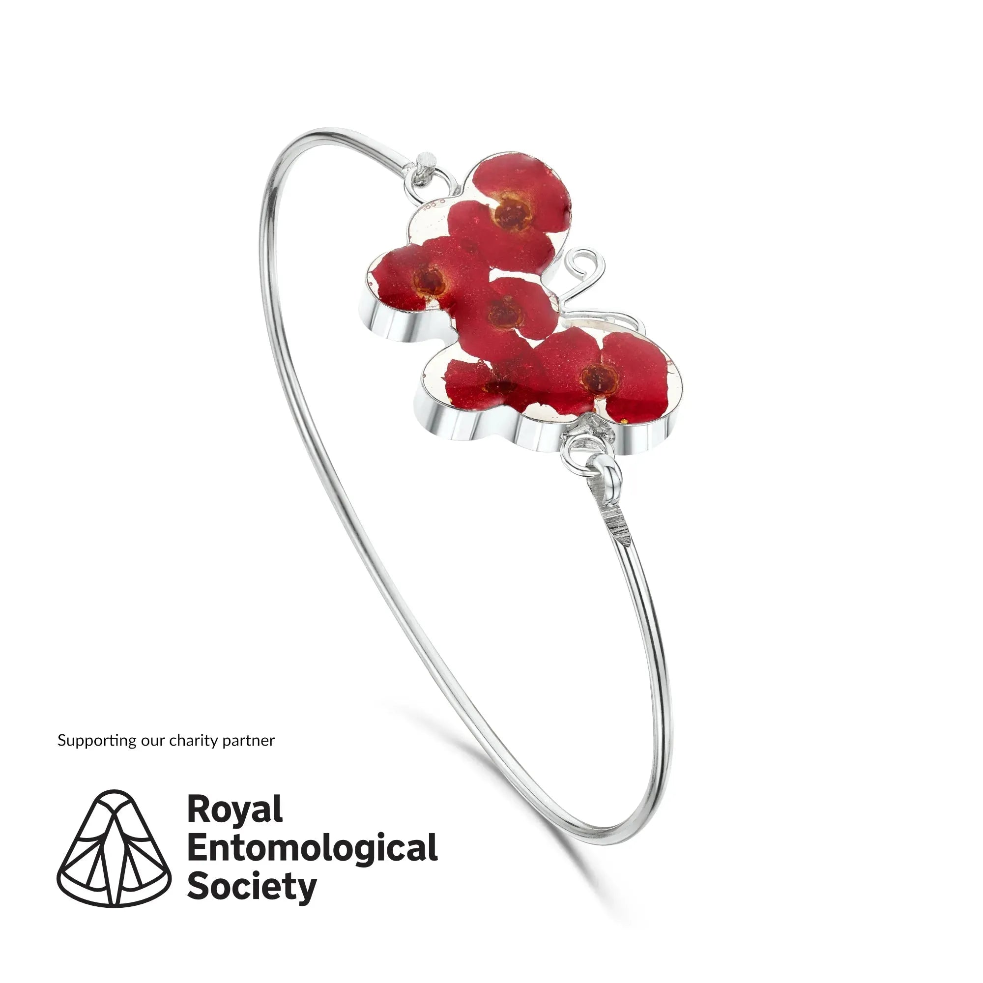 Poppy butterfly bangle with real flowers by Shrieking Violet® Sterling silver butterfly bangle. Includes giftbox.