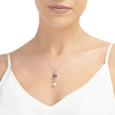 Srebrny wisiorek w kształcie serca z prawdziwymi kwiatami i zawieszką z hodowlanych pereł