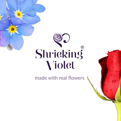 Real flower necklace by Shrieking Violet® Sterling silver oval pendant with real flowers & silver oval surround. Stylish gift for nature lovers.